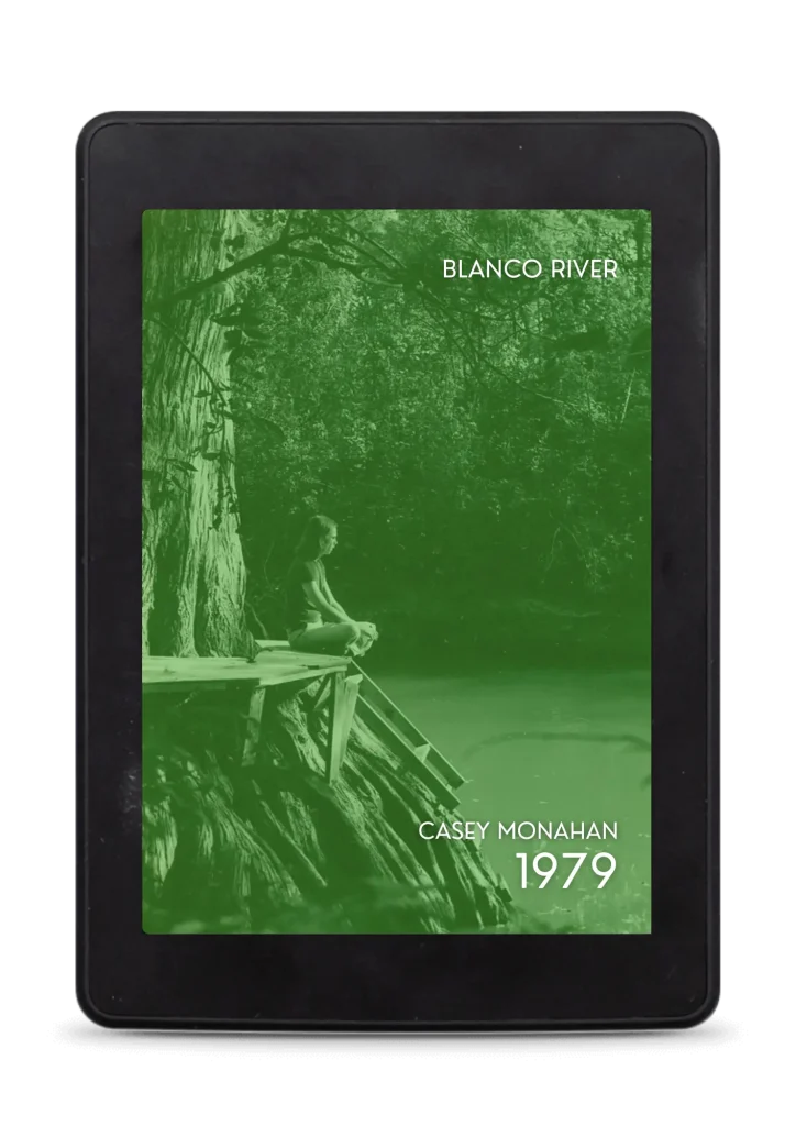 boy sitting next to a tree overlooking the Blanco River in Texas circa 1979 framed with green overlay